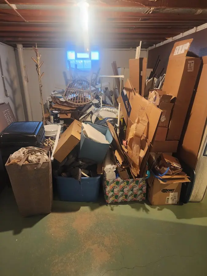 Roll-off dumpster container at job site for 15 Yard Dumpster Rental in Belle Glade